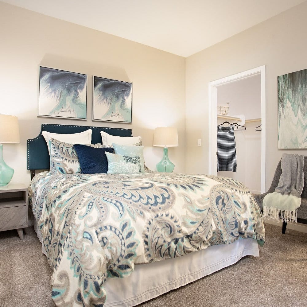 Master bedroom with plush carpeting at Zinc in Avondale, Arizona