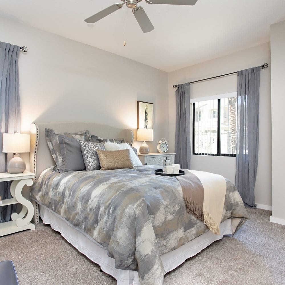 Bedroom with a ceiling fan at Zinc in Avondale, Arizona