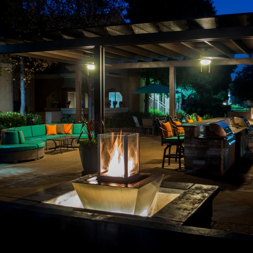 Outdoor lounge and firepit at Vineyard Gate Apartments in Roseville, California