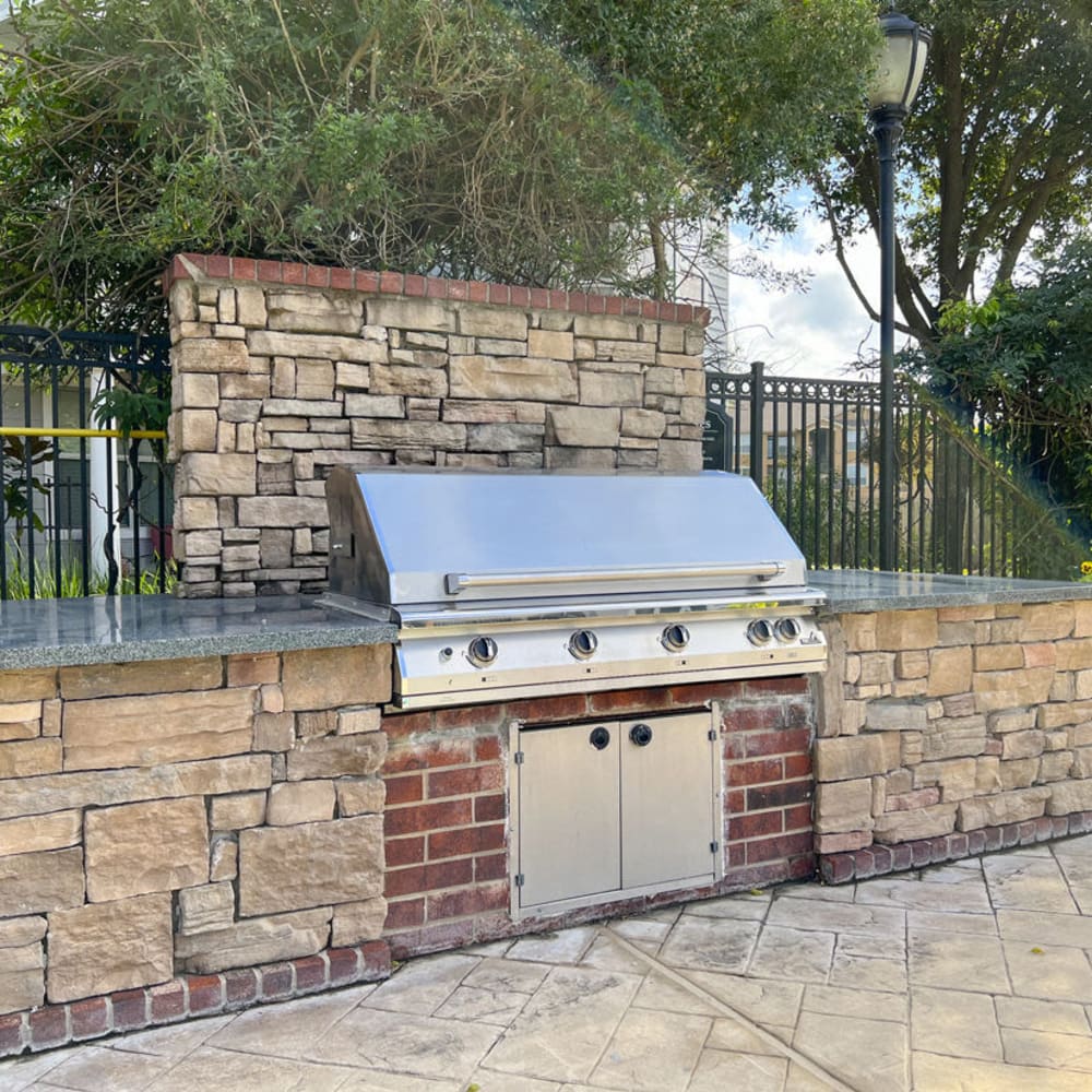 Community barbequing stations at Villas at West Road in Houston, Texas
