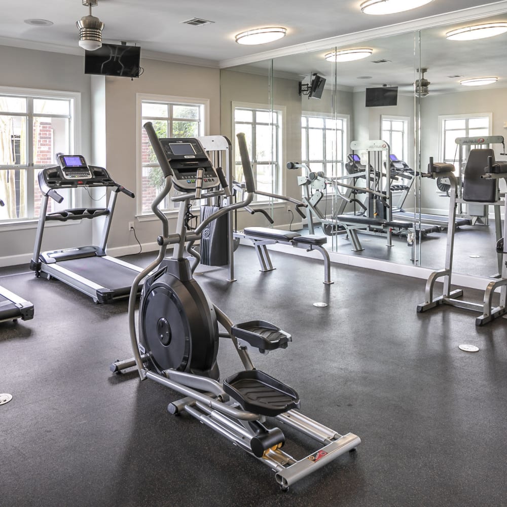 Fitness center with stair stepper at Villas at West Road in Houston, Texas