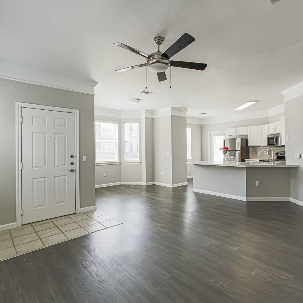 Main living space with a ceiling fan at Villas at West Road in Houston, Texas