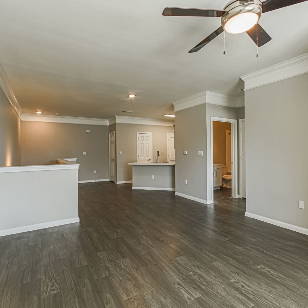 Unfurnished living space with a ceiling fan at Villas at West Road in Houston, Texas 