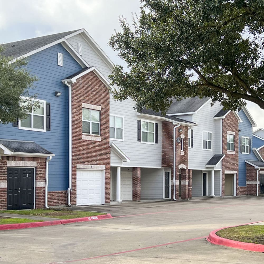 Street view of residential building at Villas at West Road in Houston, Texas
