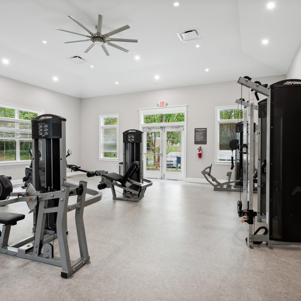 Fitness center with cardio and strength training equipment at The Villages at West Laurel in Richmond, Virginia