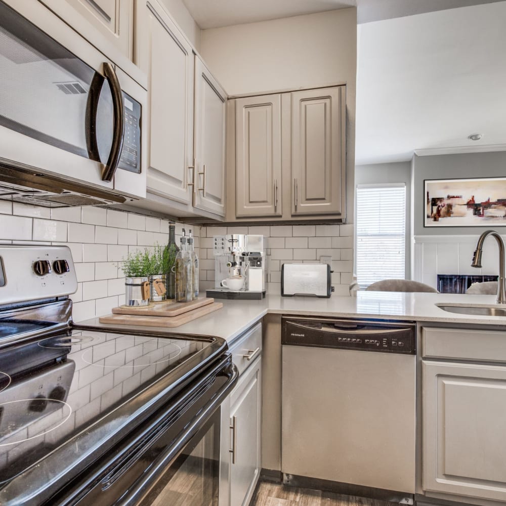 Model kitchen with modern appliances at The Heights in Arlington, Texas