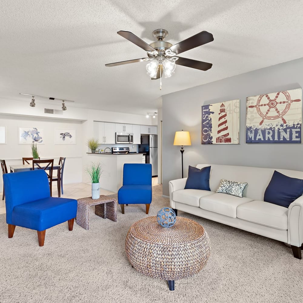 Living space with plush carpeting at Estates at Countryside in Clearwater, Florida