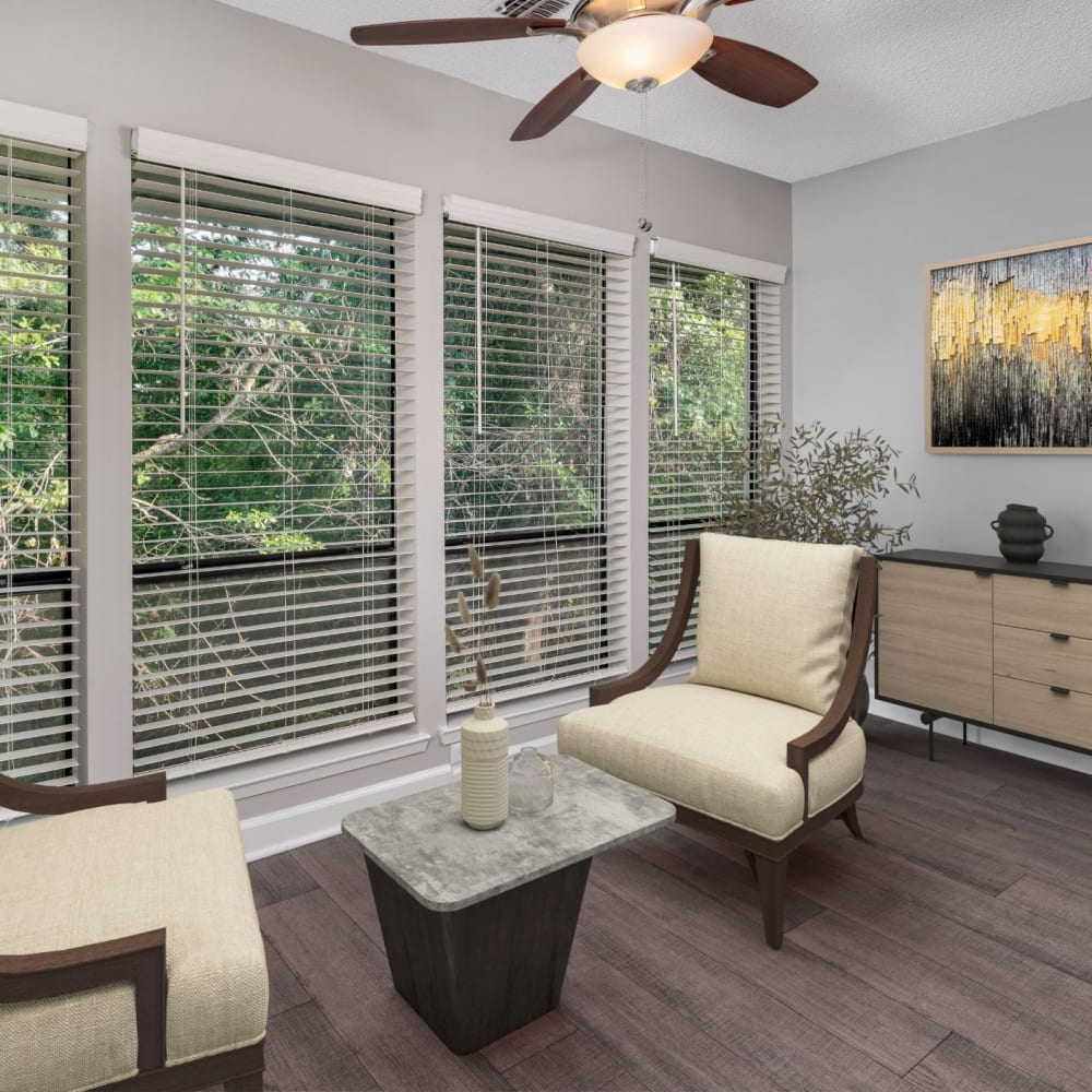 Living space with a ceiling fan at Lakeview at Palm Harbor in Palm Harbor, Florida
