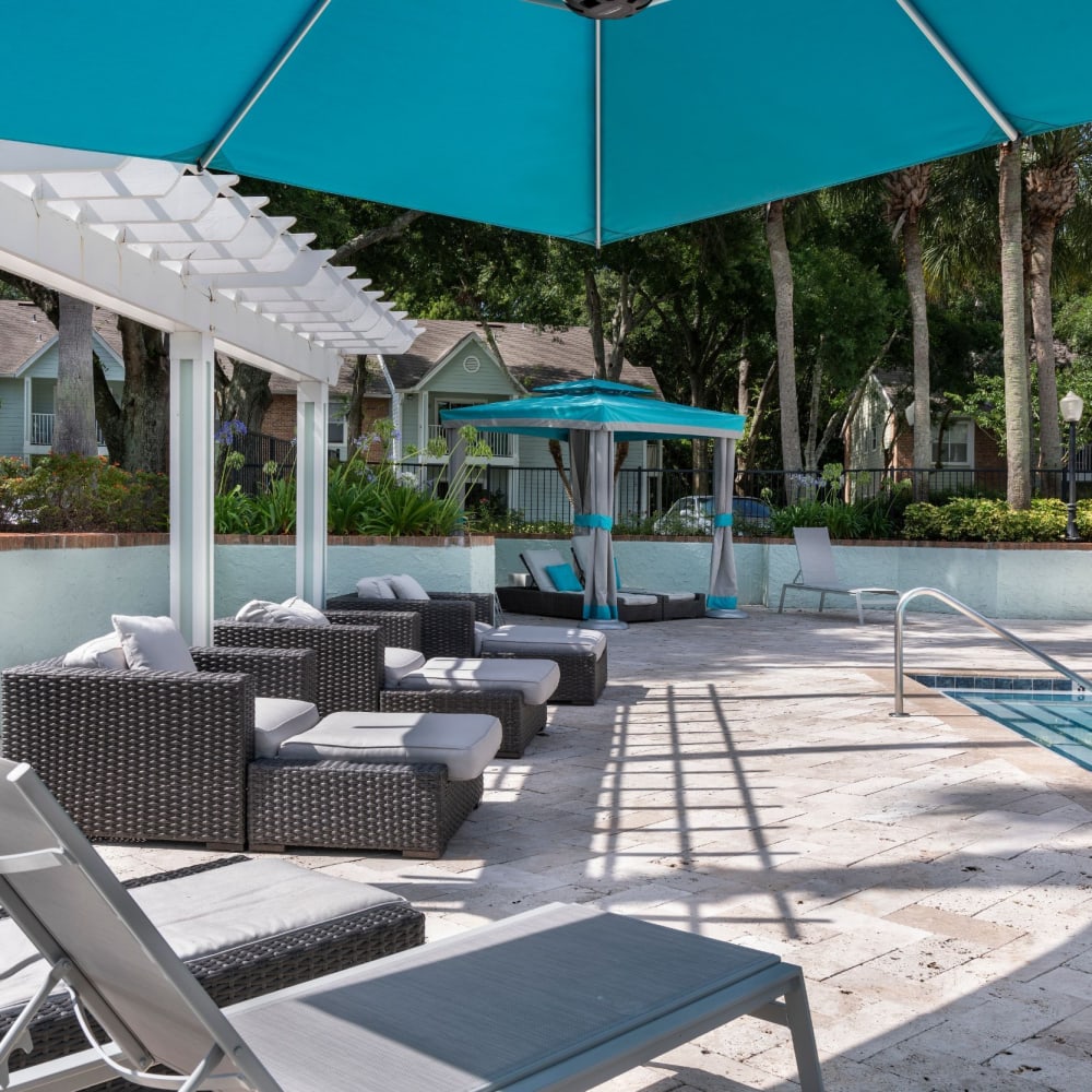 Umbrellas and shading structures pool side at Tuskawilla at Winter Springs in Winter Springs, Florida
