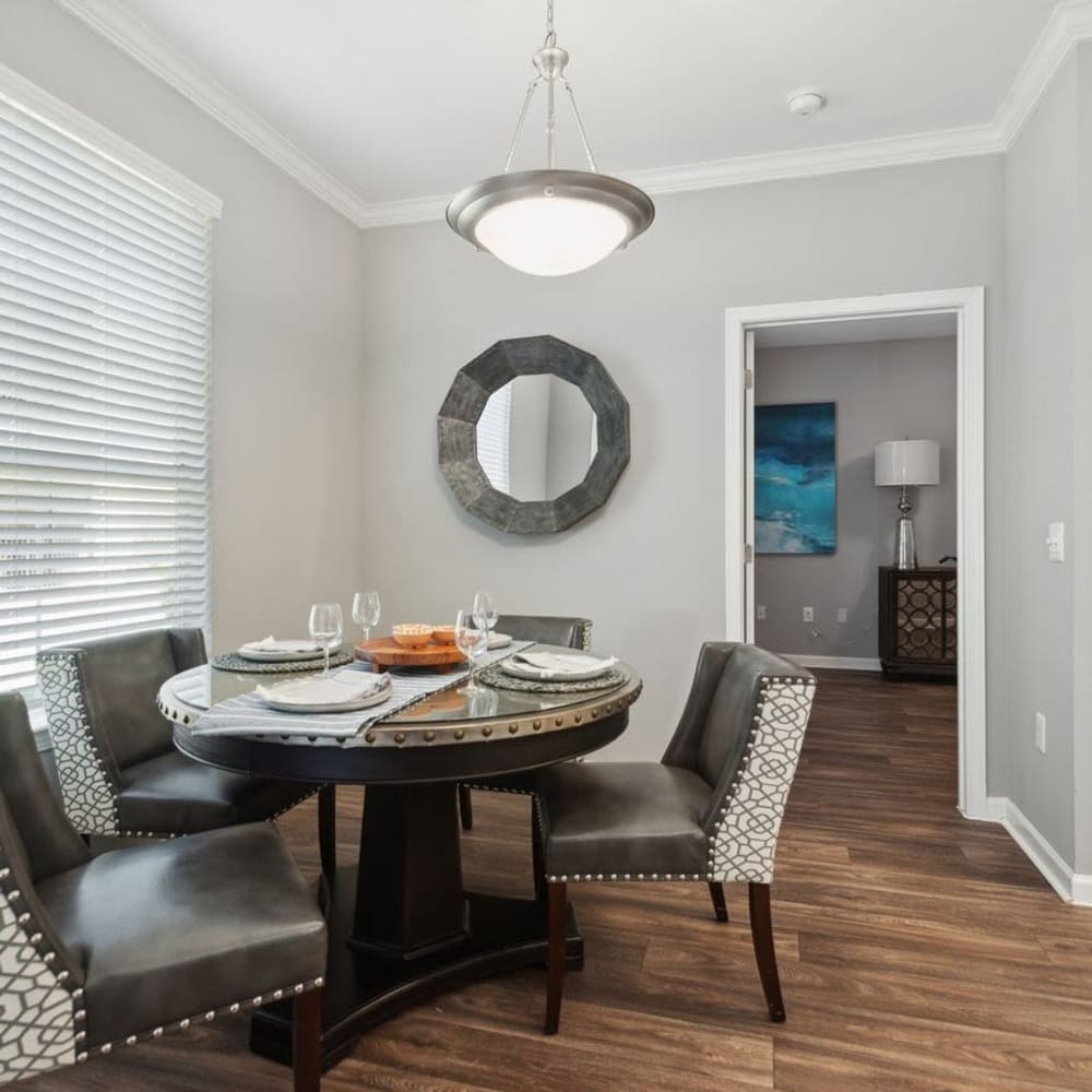 A set dining room table in an apartment at Discovery at West Road in Houston, Texas