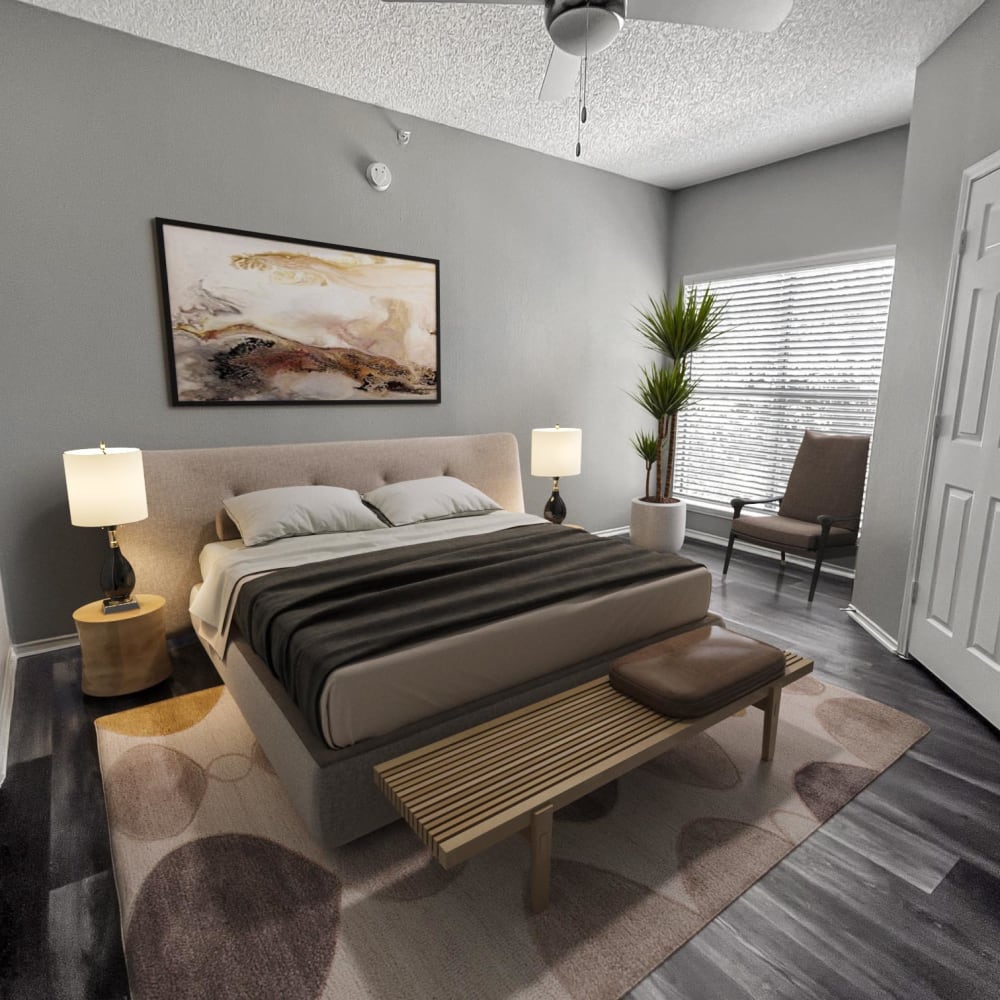 Model bedroom with gray accents at Rancho Mirage in Irving, Texas