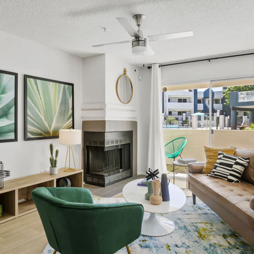 Modern living space with wood-style flooring at Jade Scottsdale in Scottsdale, Arizona