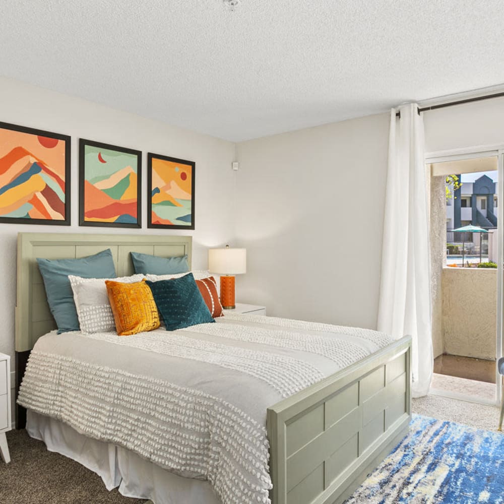 Resident bedroom with plush carpeting at Jade Scottsdale in Scottsdale, Arizona
