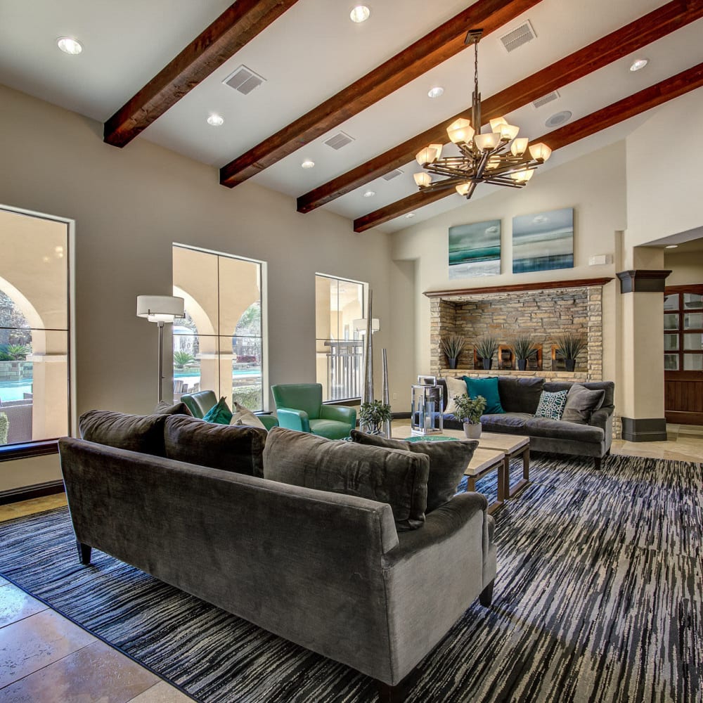Couches on a rug in the clubhouse at Estates at Canyon Ridge in San Antonio, Texas