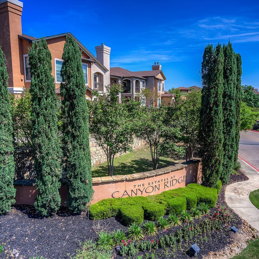 Beautifully landscaped landmark at Estates at Canyon Ridge in San Antonio, Texas