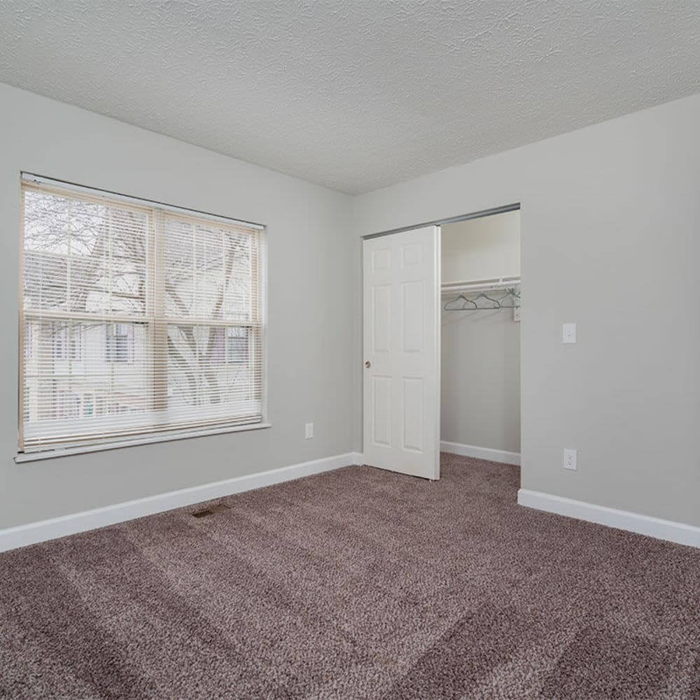 Bedroom with ample natural light at Mason Row Townhomes in Dublin, Ohio