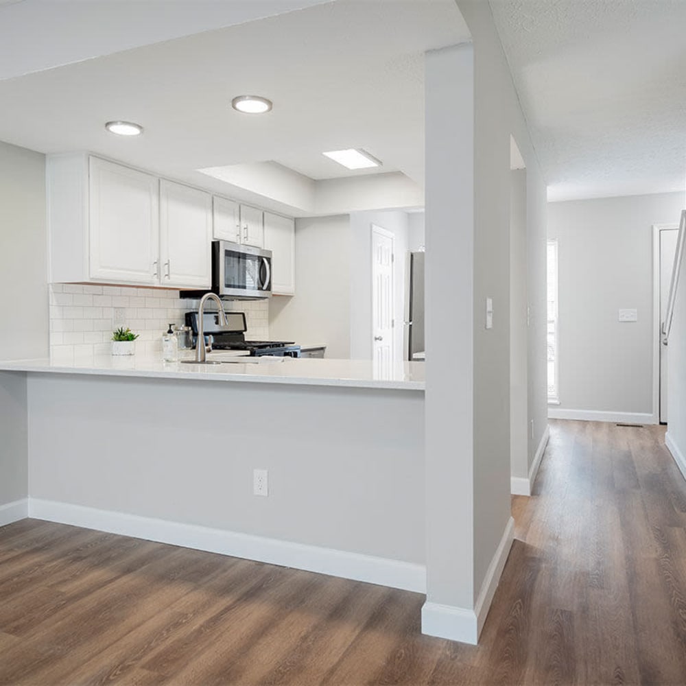 Serving counter separates kitchen from living space at Mason Row Townhomes in Dublin, Ohio