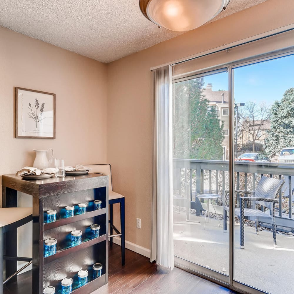 Balcony access from living space at Village On Cypress in Thornton, Colorado