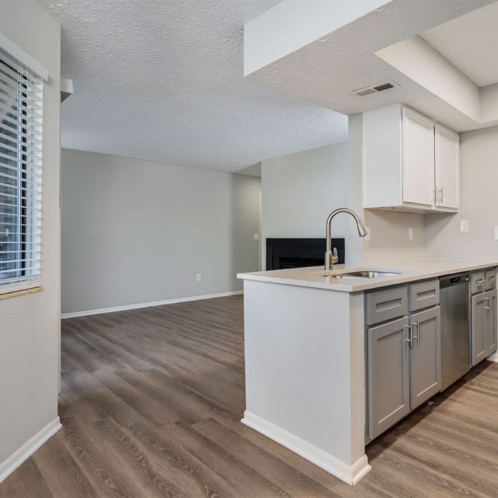 Kitchen space leading into the living room at Ashlar Flats in Dublin, Ohio