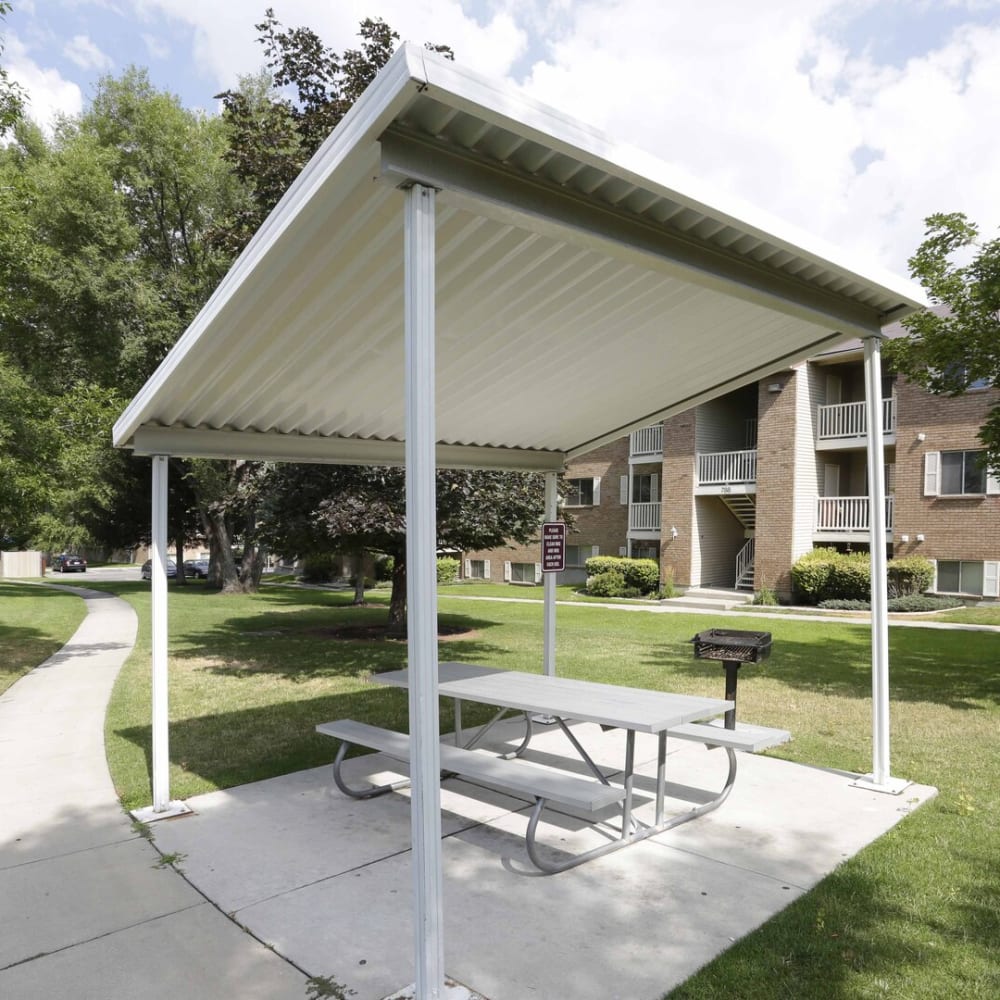 A covered picnic table at Chadds Ford Apartments in Midvale, Utah