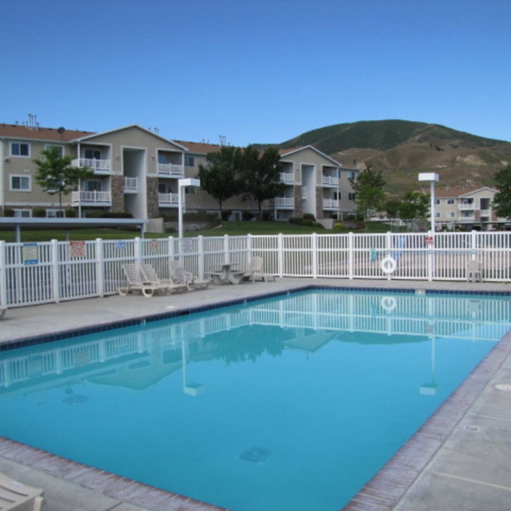 The gated community swimming pool at Falcon Park Apartments in Layton, Utah