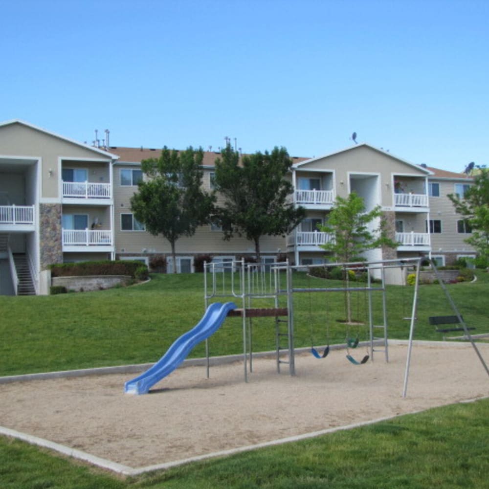 The community playground at Falcon Park Apartments in Layton, Utah