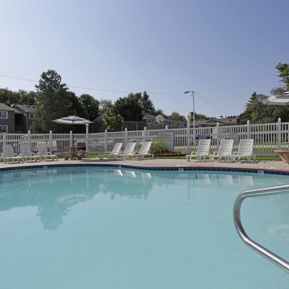 The sparkling community swimming pool at Mark Twain Apartments in Salt Lake City, Utah