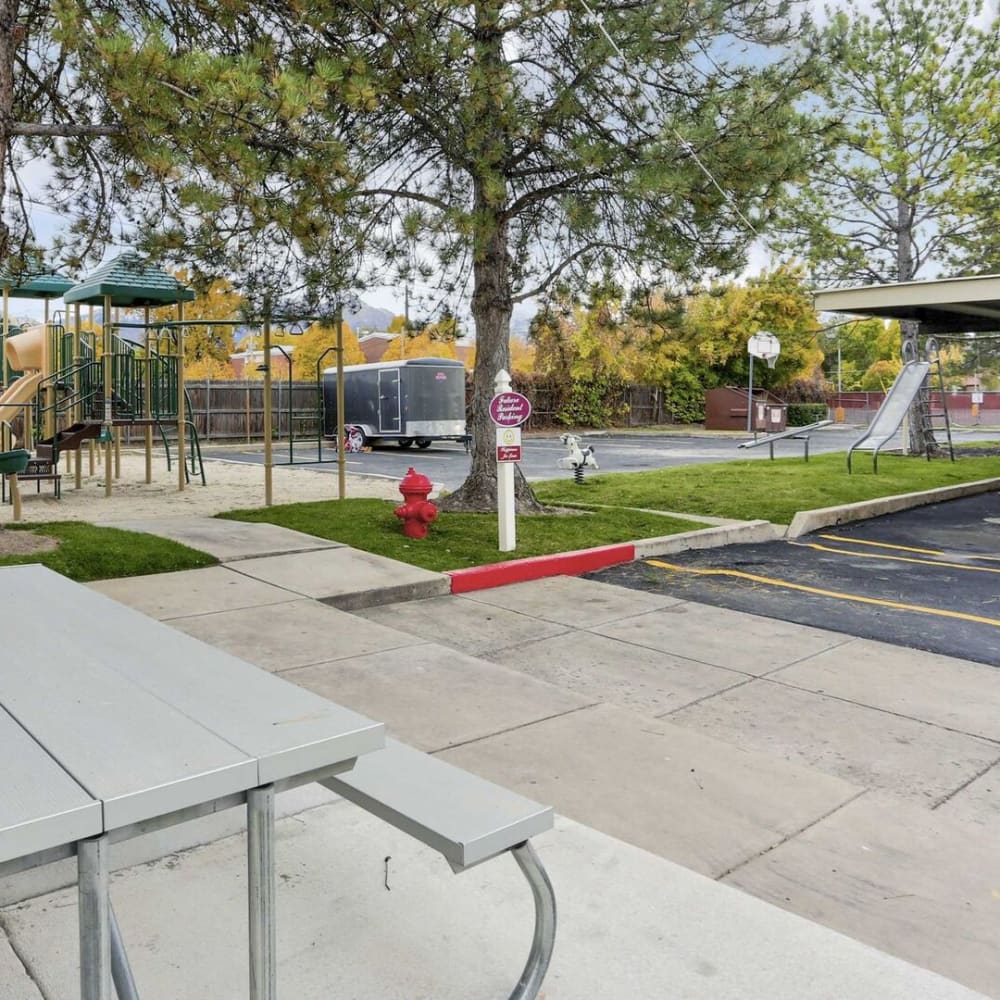 An outdoor table outside for residents at Regency Apartments in Salt Lake City, Utah