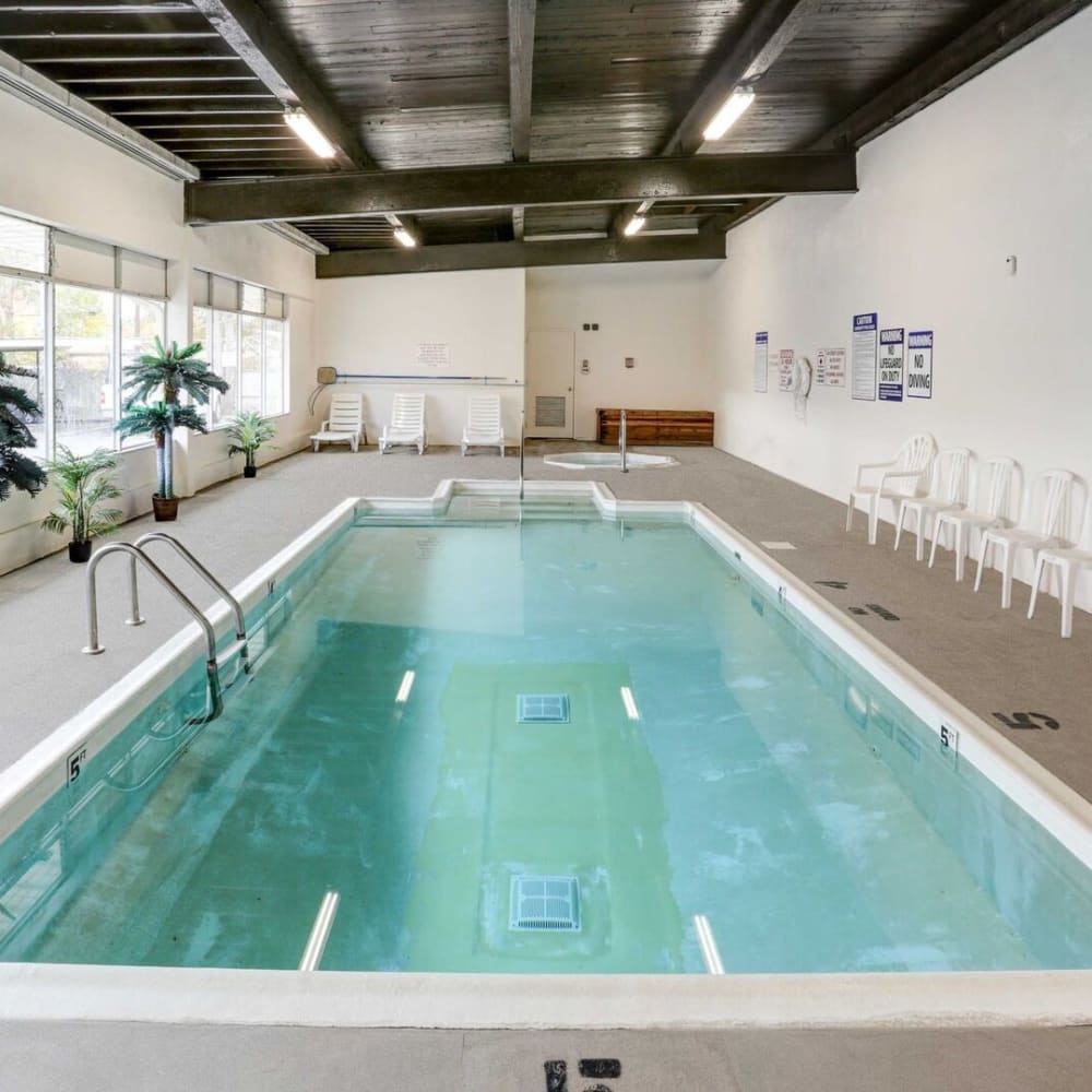 The sparkling indoor swimming pool at Regency Apartments in Salt Lake City, Utah