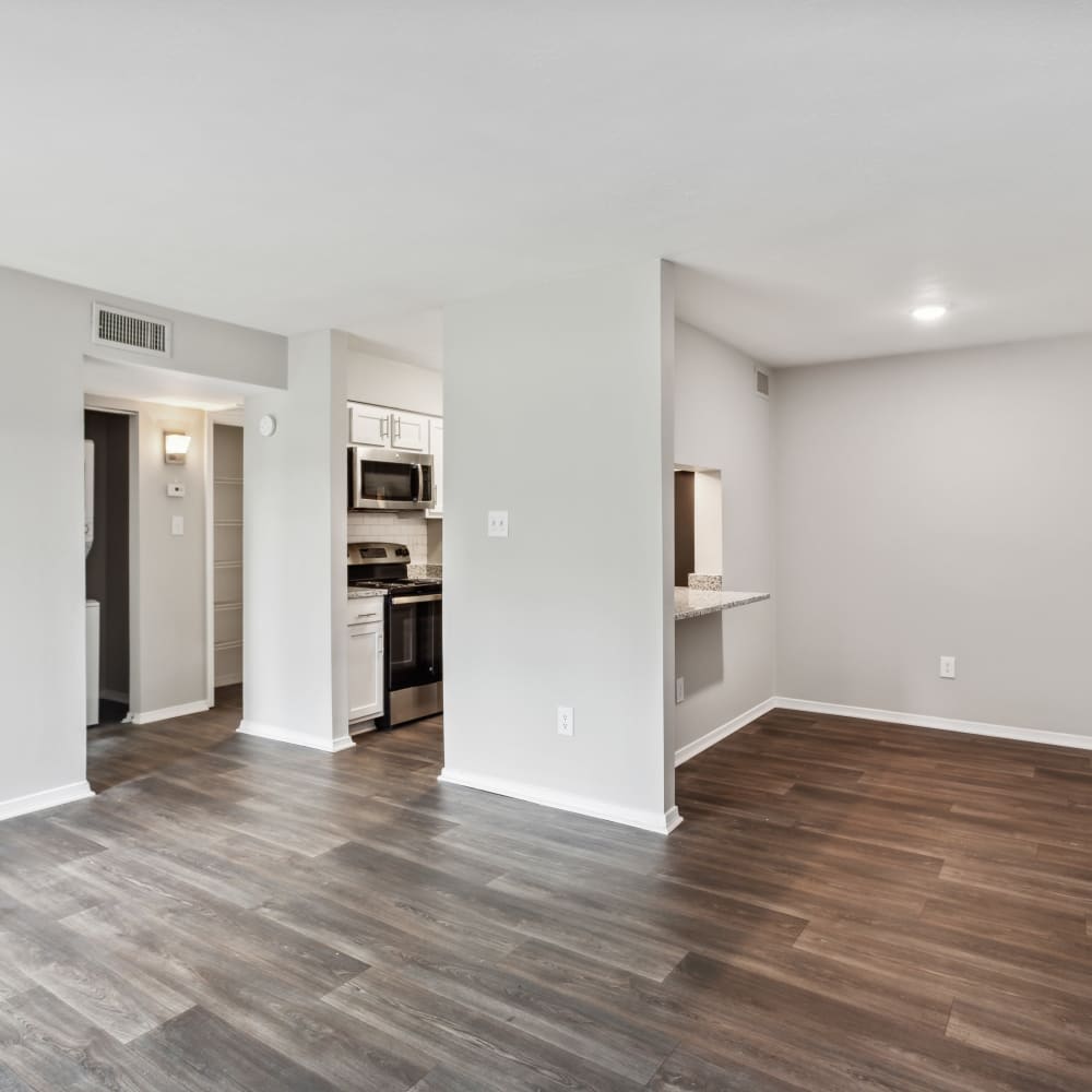 Wood flooring in an apartment dining room and living room at Park West End in Richmond, Virginia
