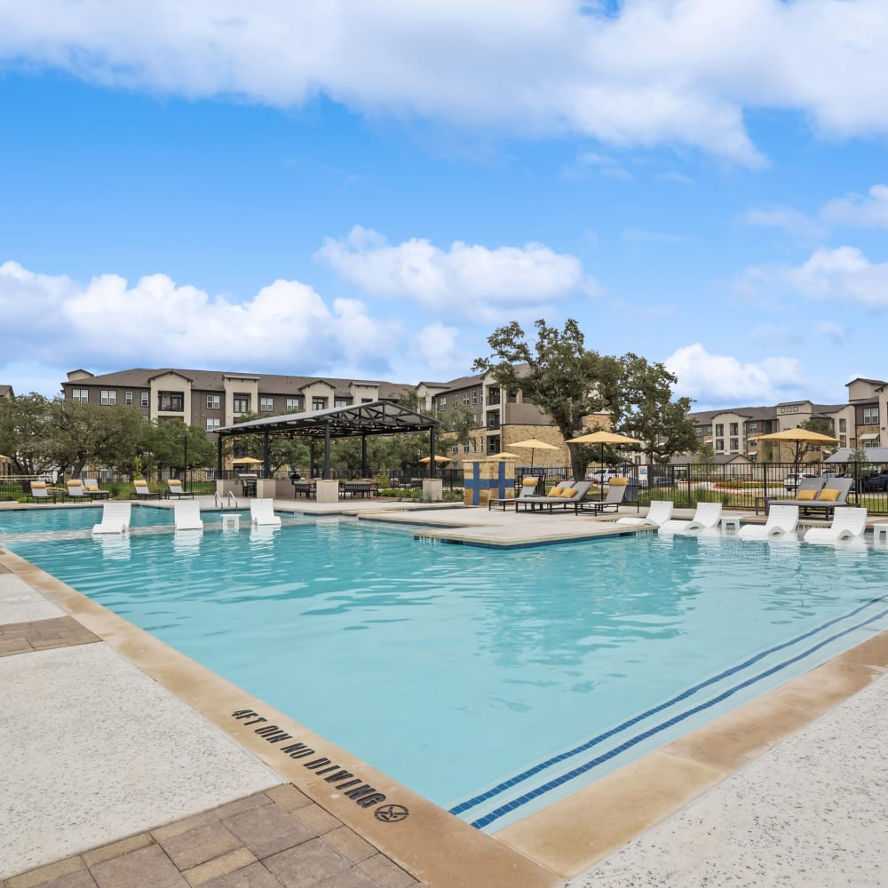 The resort-style community pool at Radius Wolf Ranch in Georgetown, Texas