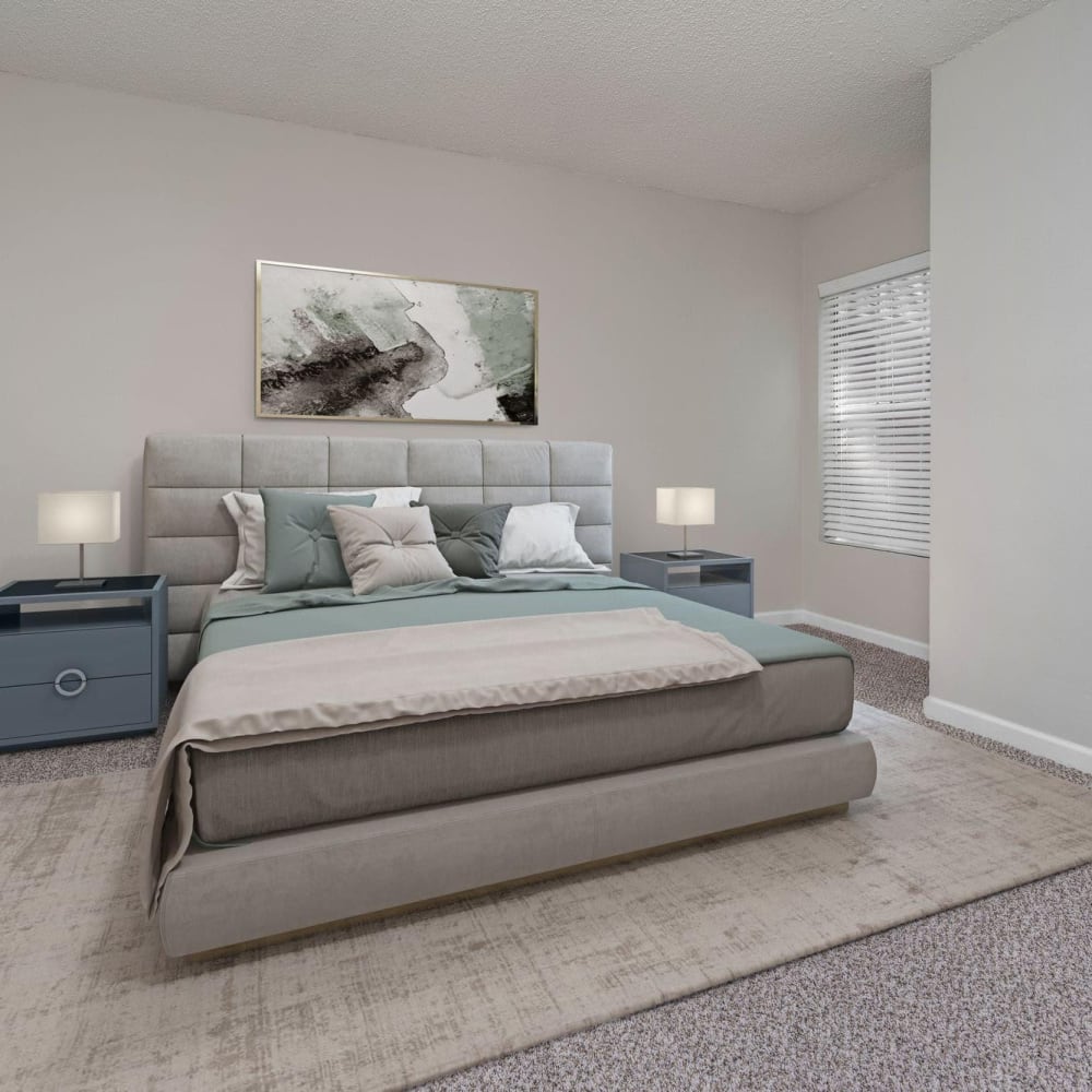 Master bedroom with plush carpeting at Twin Lakes in Palm Harbor, Florida