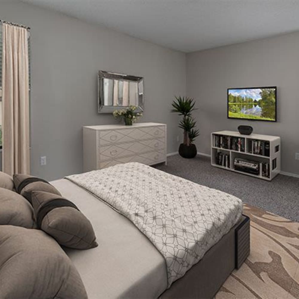 Another view of bedroom at with a bed and a dresser at The Edge at Lake Lotus in Altamonte Springs, Florida