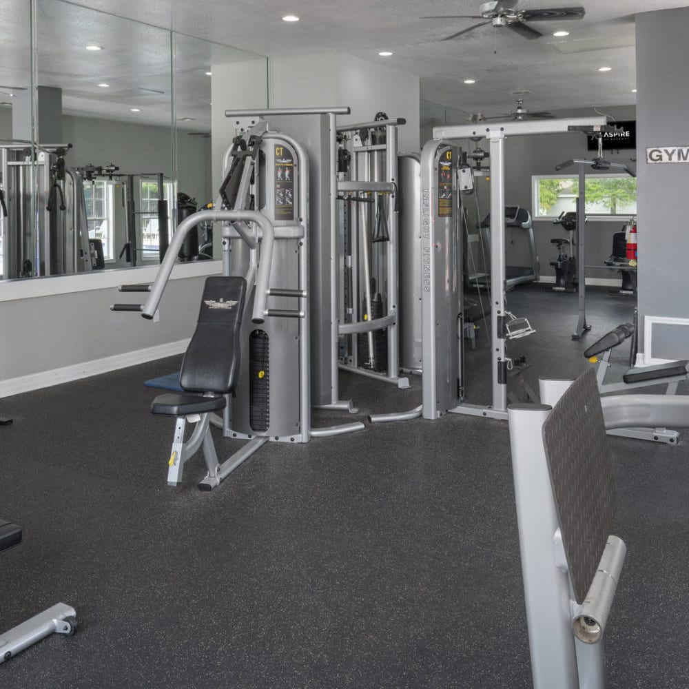Fitness center with exercise machines at Aspire at Gateway in Pinellas Park, Florida