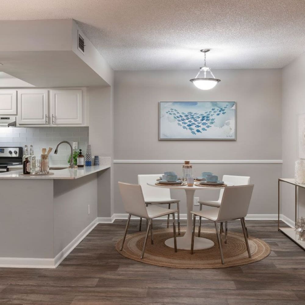 Dinning area with table and chairs at Ashley Lake Park Apartments in Boynton Beach, Florida