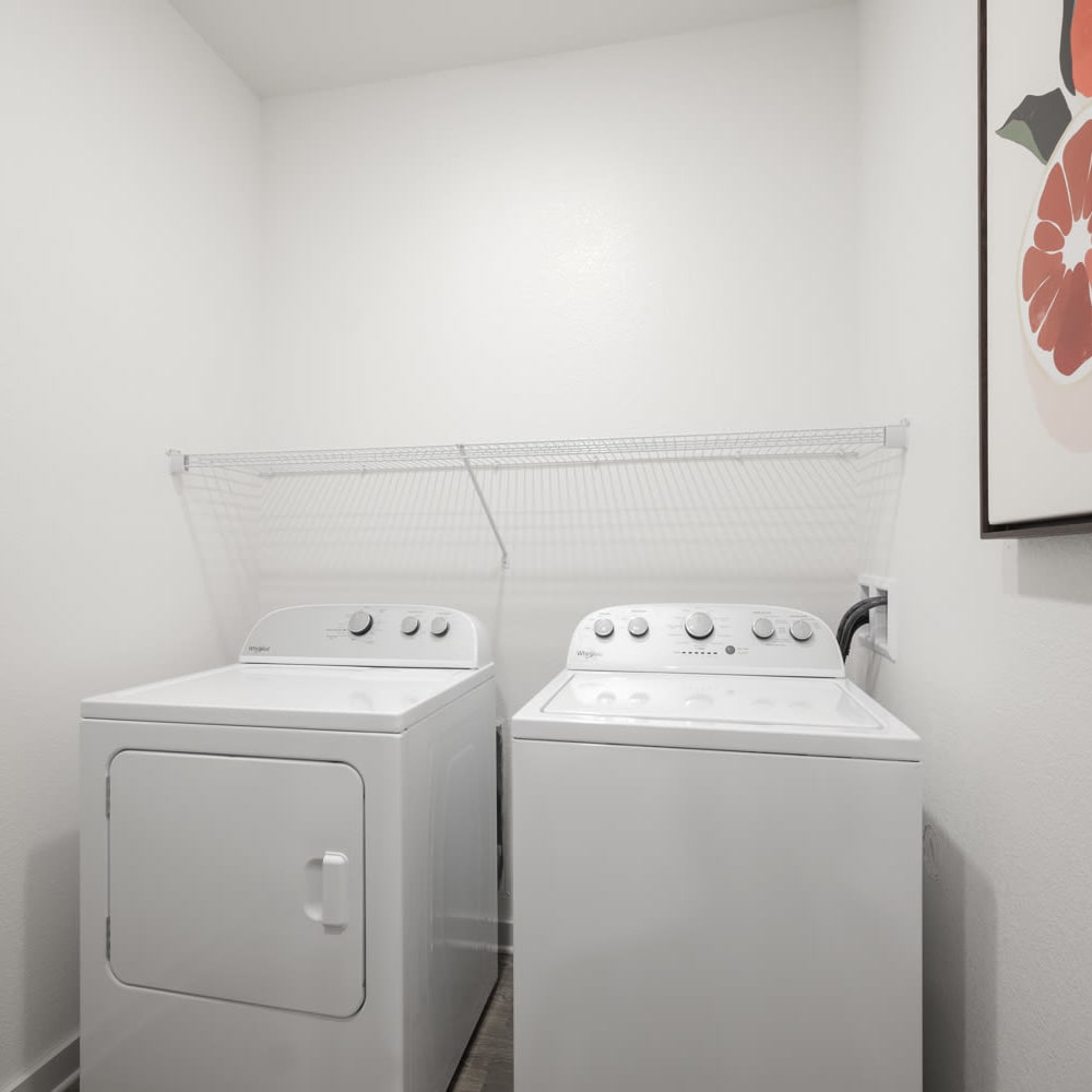 A full-sized washer and dryer in an apartment at Novo Westlake in Jacksonville, Florida