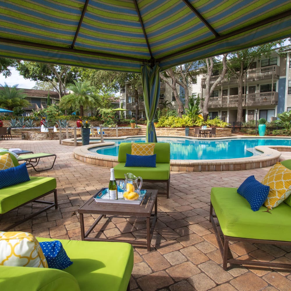 Cozy pool side seating at Stillwater Palms in Palm Harbor, Florida