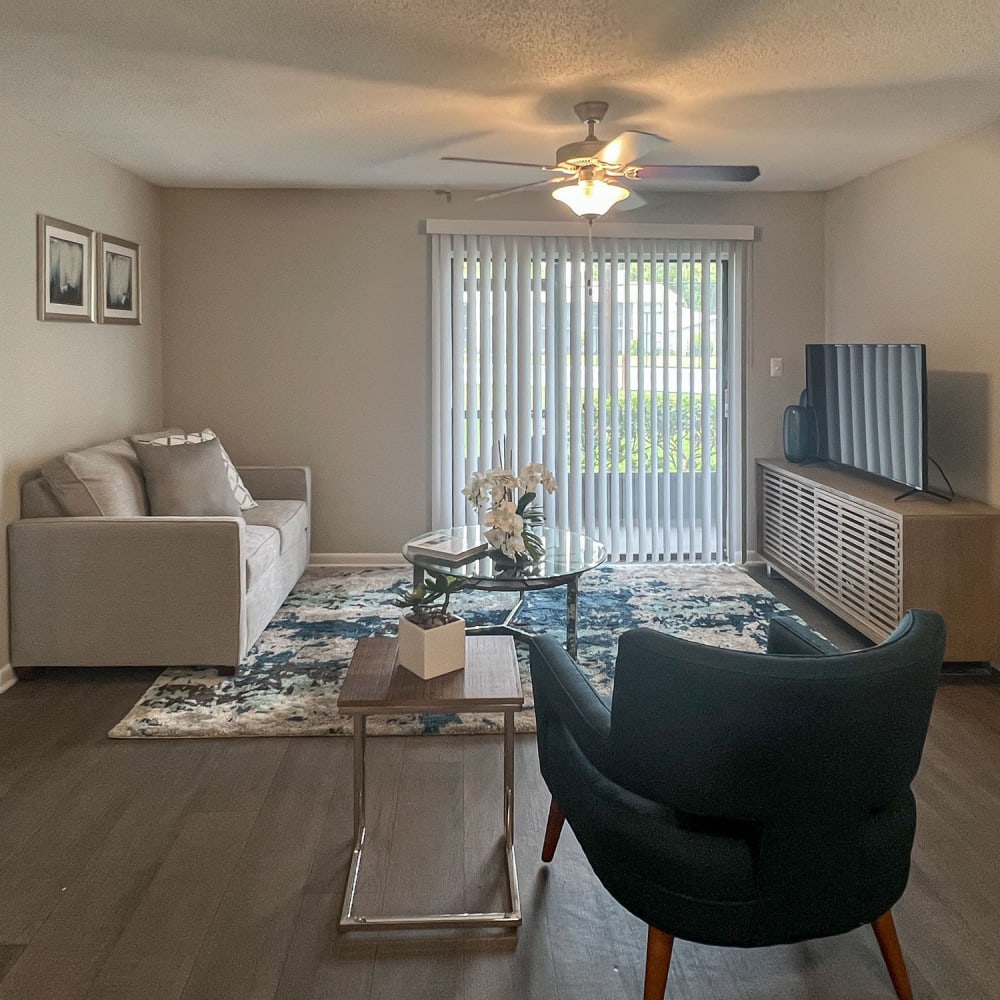 Open living space with wood-style flooring at WestEnd Apartments in Tampa, Florida