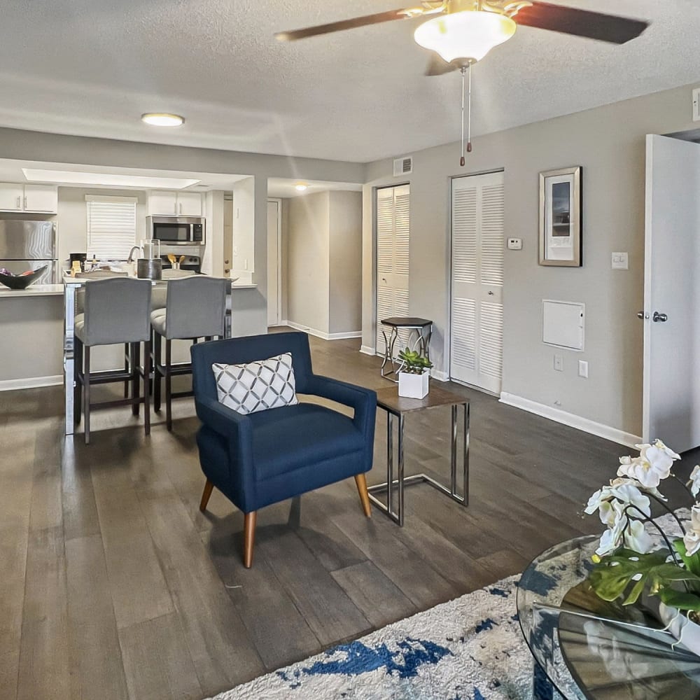 Open living space with wood-style flooring at WestEnd Apartments in Tampa, Florida