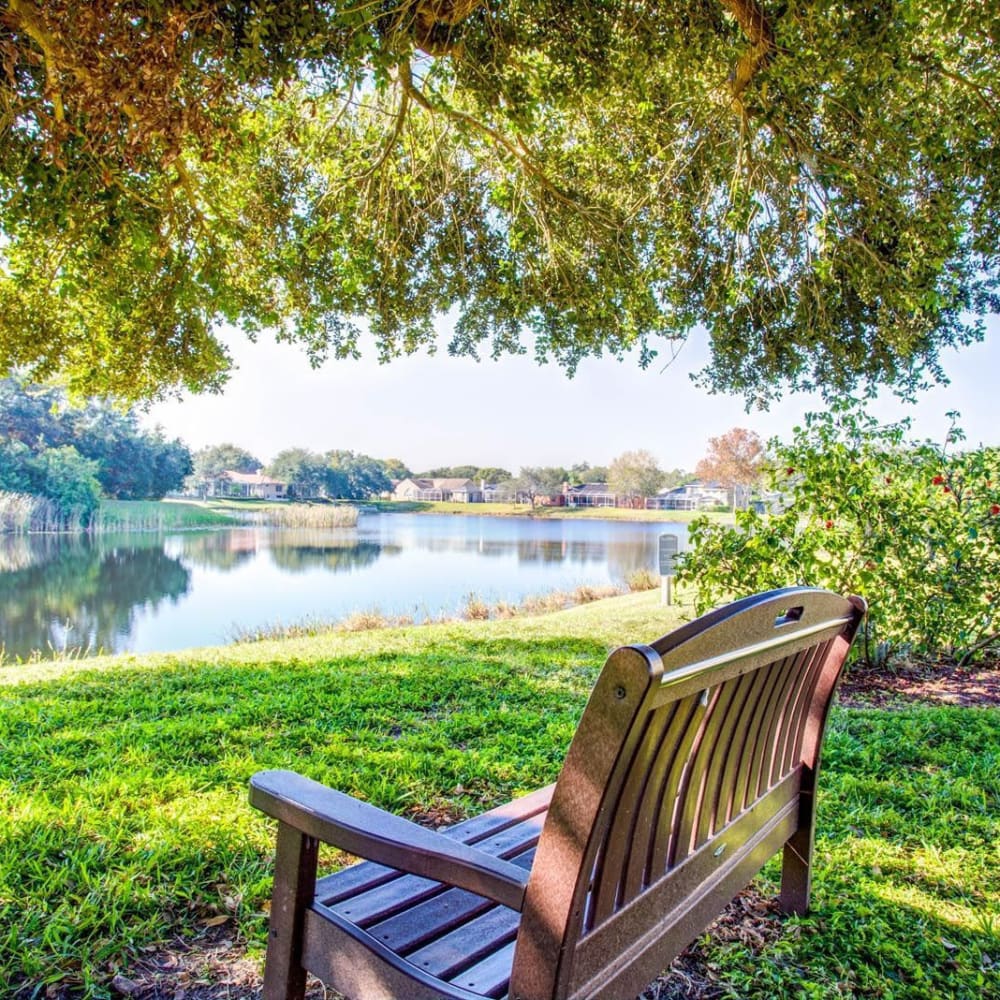 Large pond with quiet seating at Bayou Point in Pinellas Park, Florida