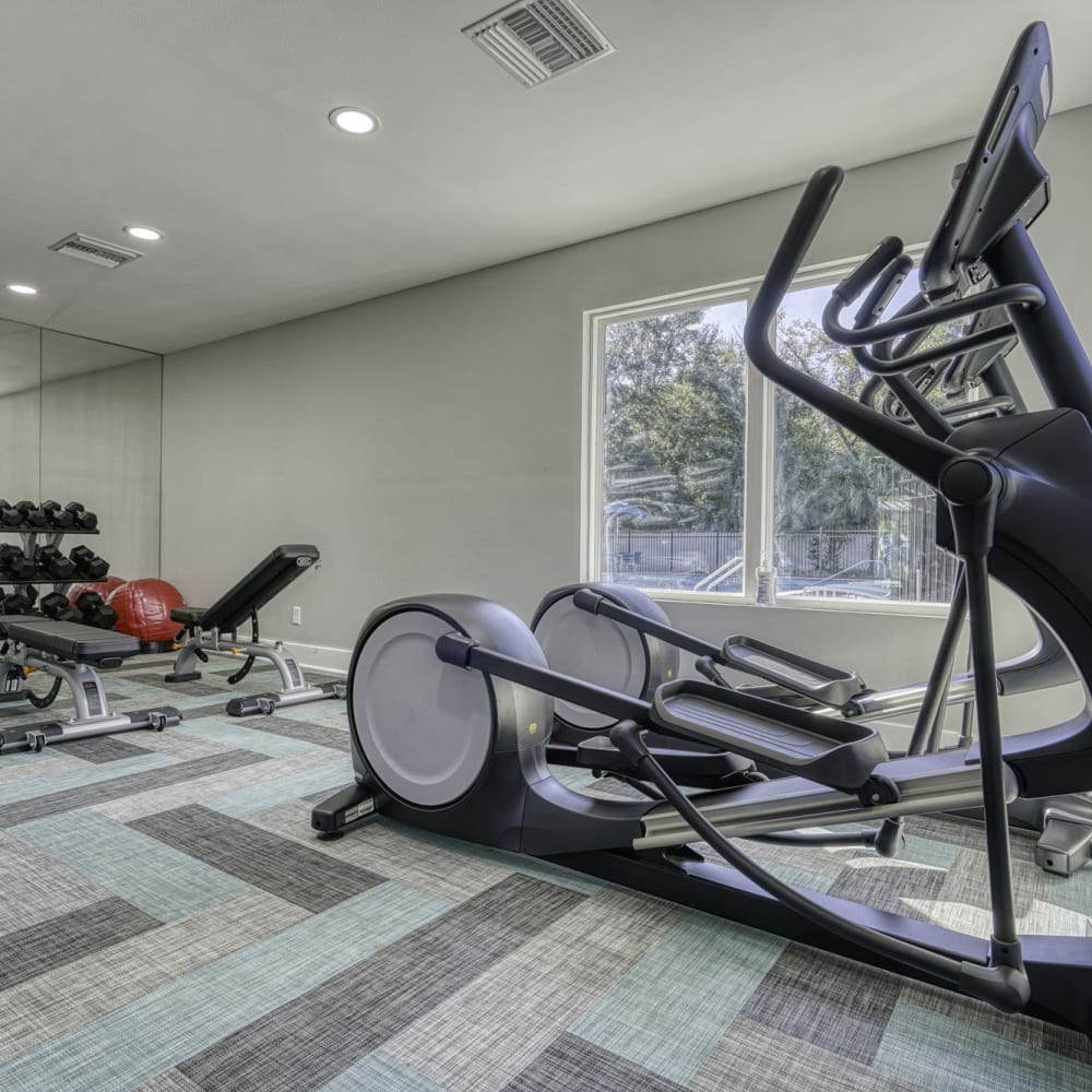 Fitness center with free weights at Edge at Lakeside in Orange Park, Florida