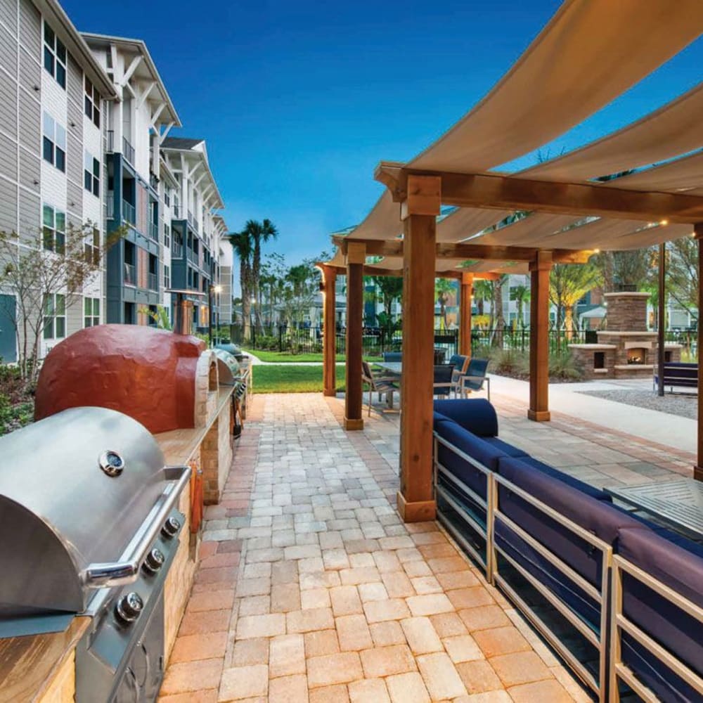 Barbequing stations at Alcove Apartments in Orlando, Florida