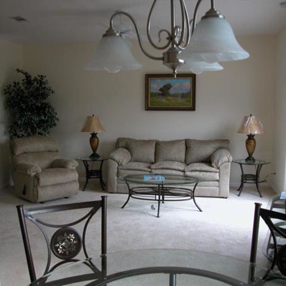 An apartment dining room and living room at Mod Villas in Kingsland, Georgia