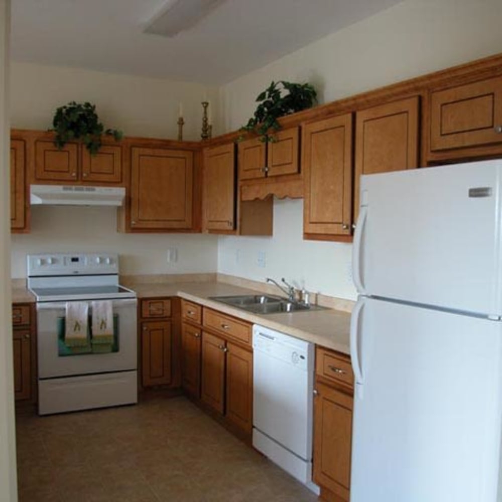 White appliances in an apartment kitchen at Mod Villas in Kingsland, Georgia