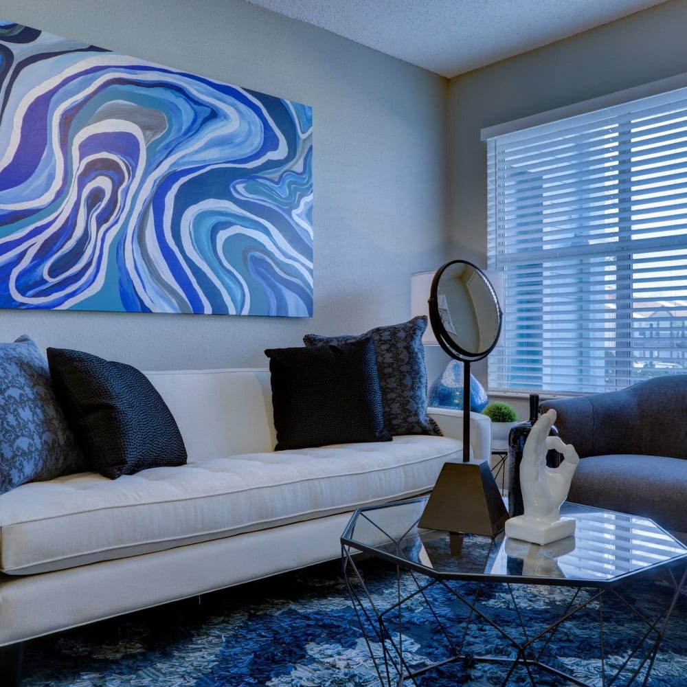 A furnished living room of an apartment home at Clinton Towne Center Apartments in Clinton, Utah