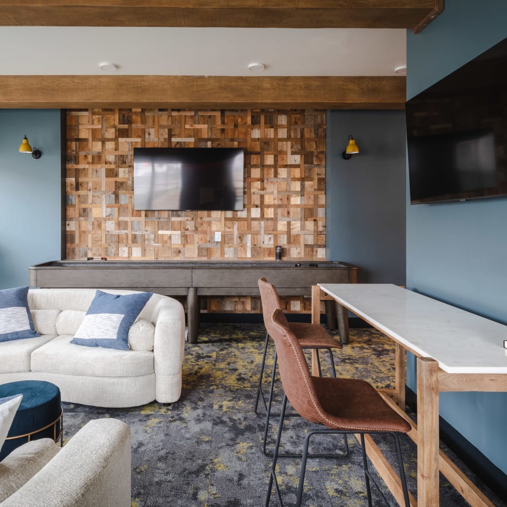 Comfortable clubhouse seating at Ladora Modern Apartments in Denver, Colorado