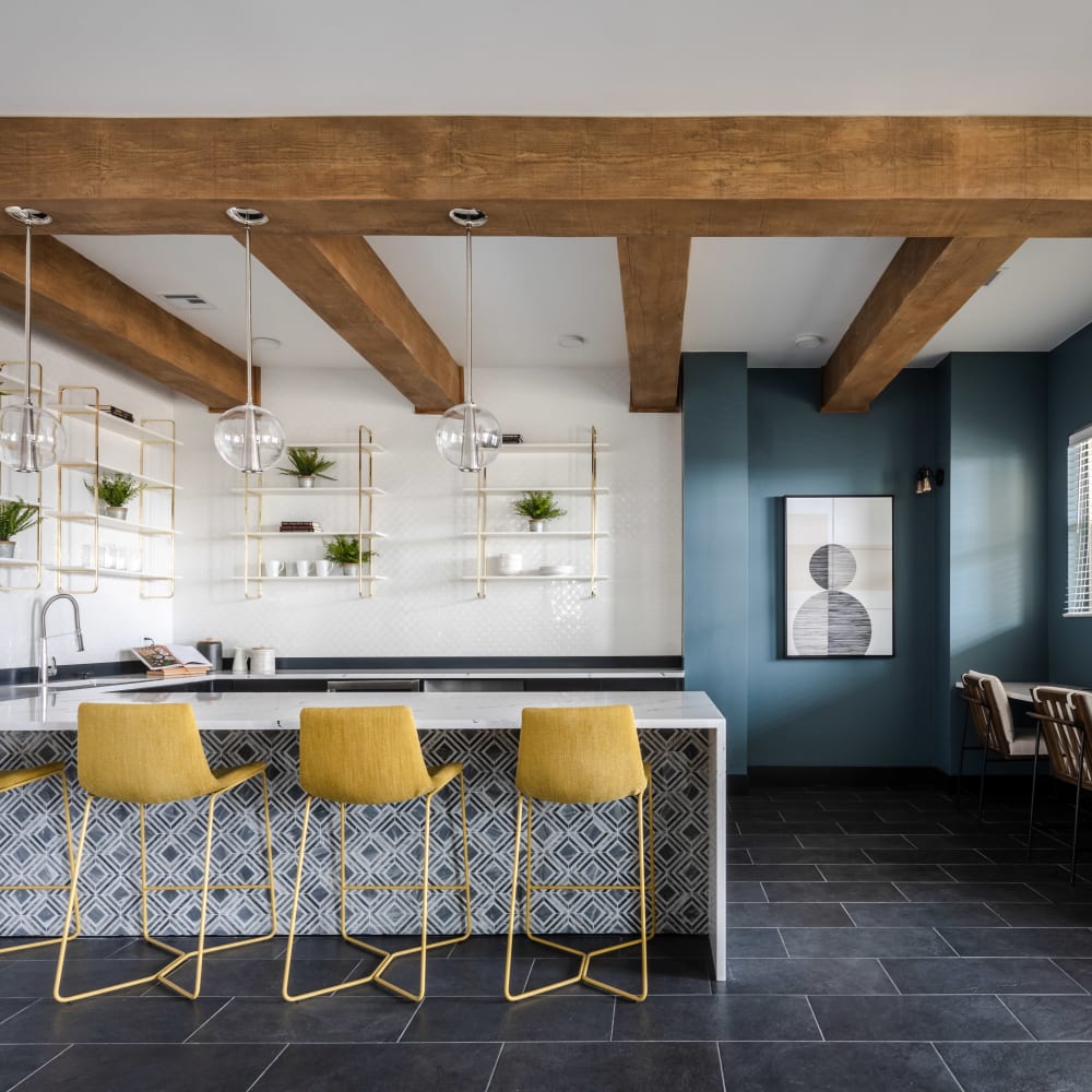 Kitchen seating in the clubhouse at Ladora Modern Apartments in Denver, Colorado