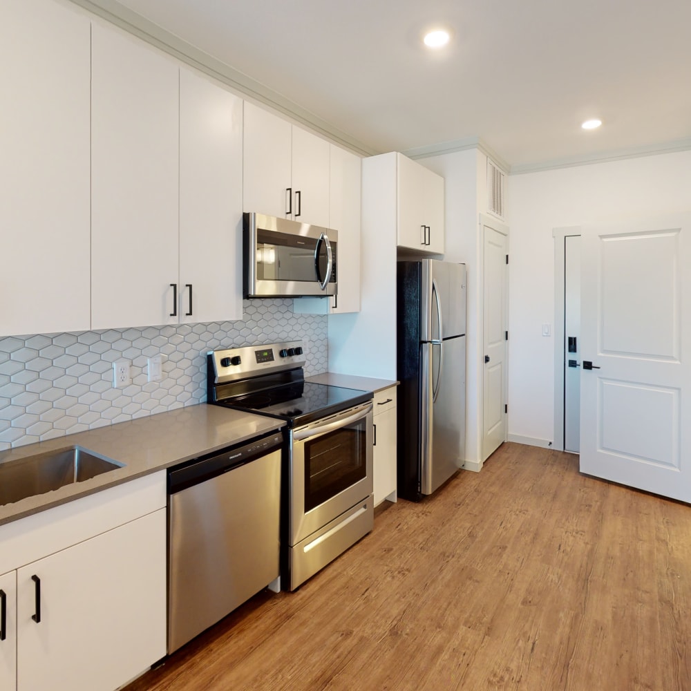 Stainless-steel appliances in a model apartment at The Prospector Modern Apartments in Castle Rock, Colorado