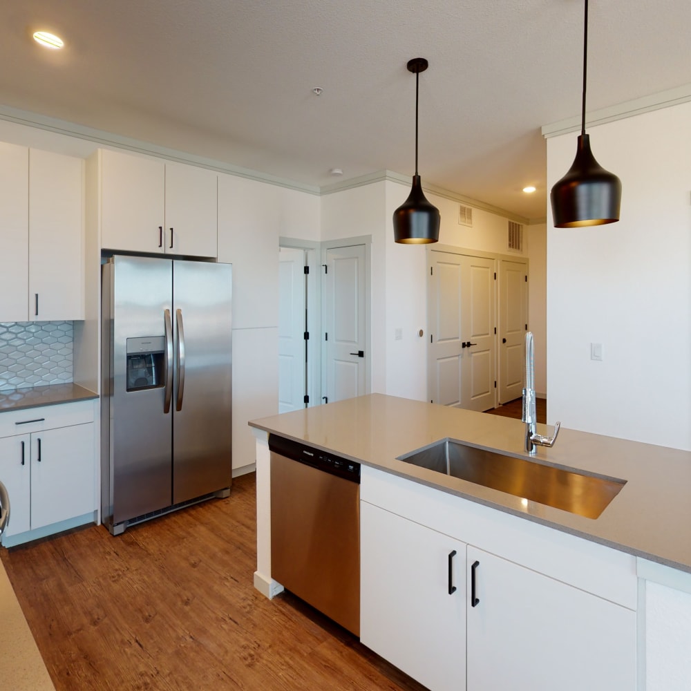 Modern model kitchen at The Prospector Modern Apartments in Castle Rock, Colorado