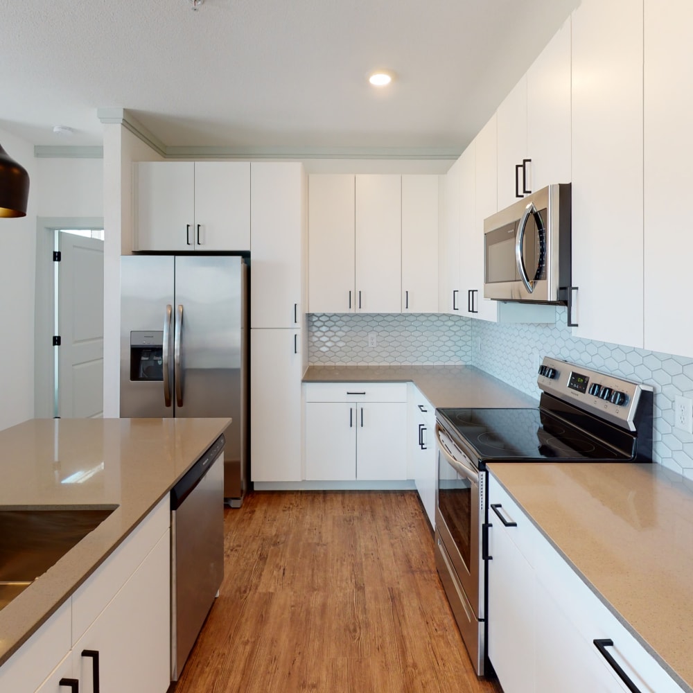 Modern model kitchen at The Prospector Modern Apartments in Castle Rock, Colorado